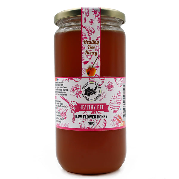 Jar of honey with a 'Healthy Bee' label on a white background